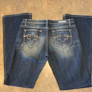 REROCK FOR EXPRESS BOOT CUT JEANS. SIZE 10L.